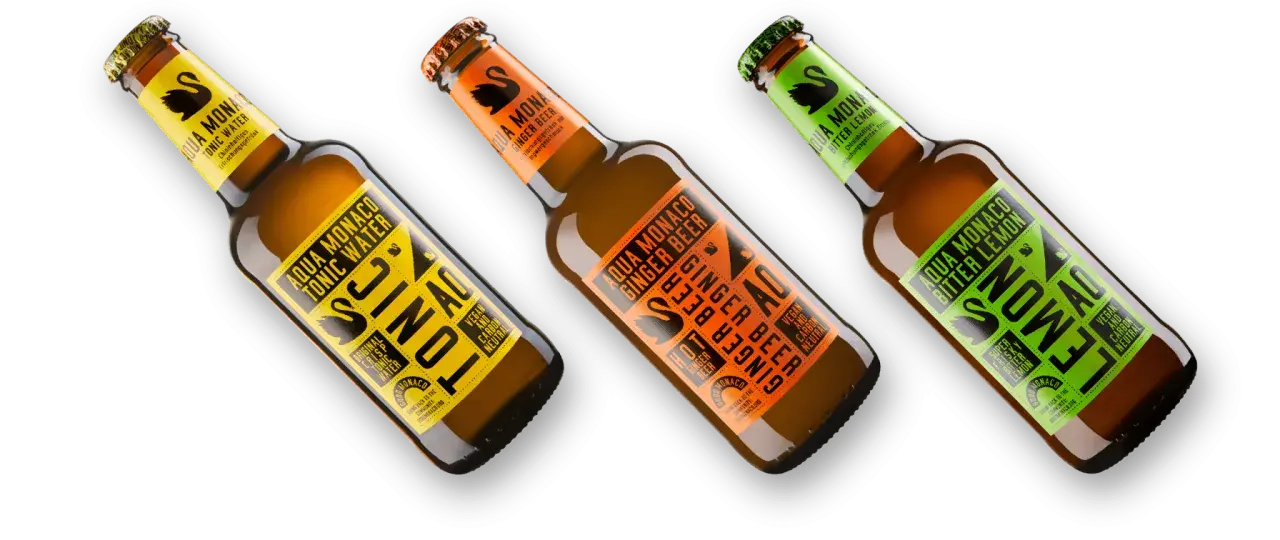 Drei Flaschen Aqua Monaco: Tonic Water, Ginger Beer und Bitter Lemon. Erfrischende Getränke für jeden Geschmack.