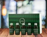 Eine Auswahl an Whiskys, darunter ein Sea Shepherd Islay Single Malt Scotch Whisky, eine Starward Two Fold Australian Whisky Flasche und eine Tasting Circle Box mit verschiedenen Blended Malt Whiskys.
